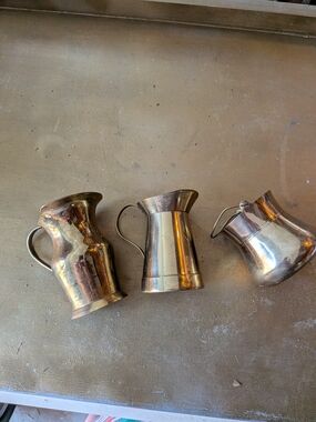 Set of Three Brass Pitchers - Shiny Gold Finish